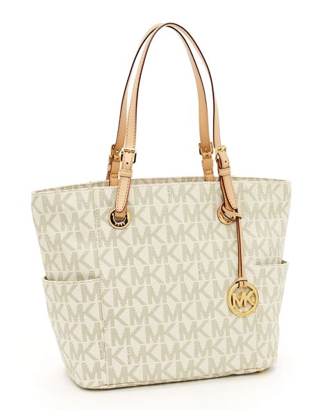 michael kors jet set ew signature tote vanilla|Michael Kors airplane bag.